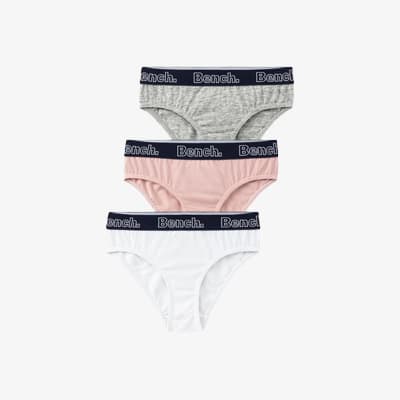 Drei Bench Slips in Grau, Rosa und Weiß, gestapelt.