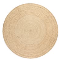 Runder, hellbeiger Teppich mit konzentrischen Kreisen